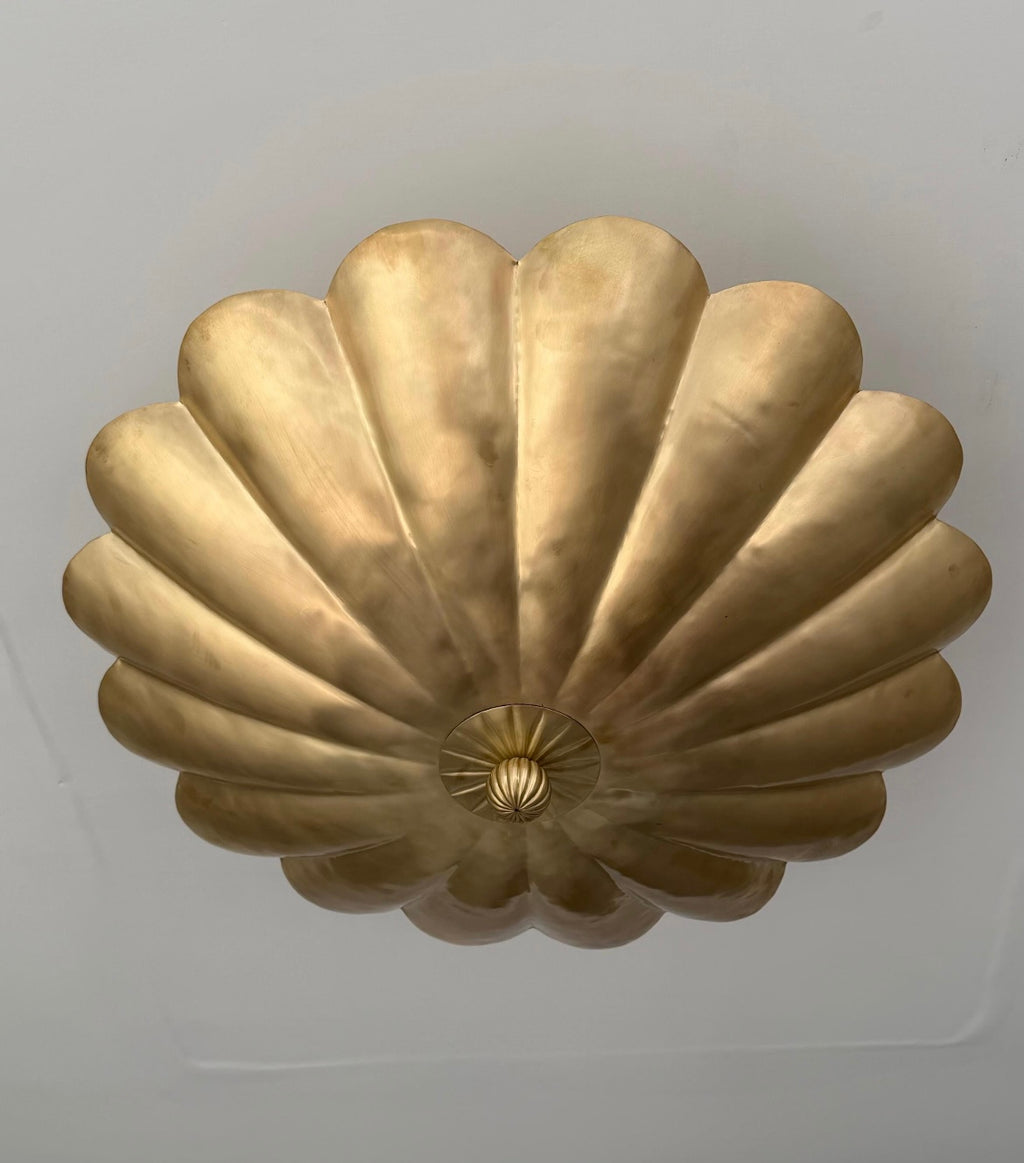 Brushed brass lotus-inspired ceiling light