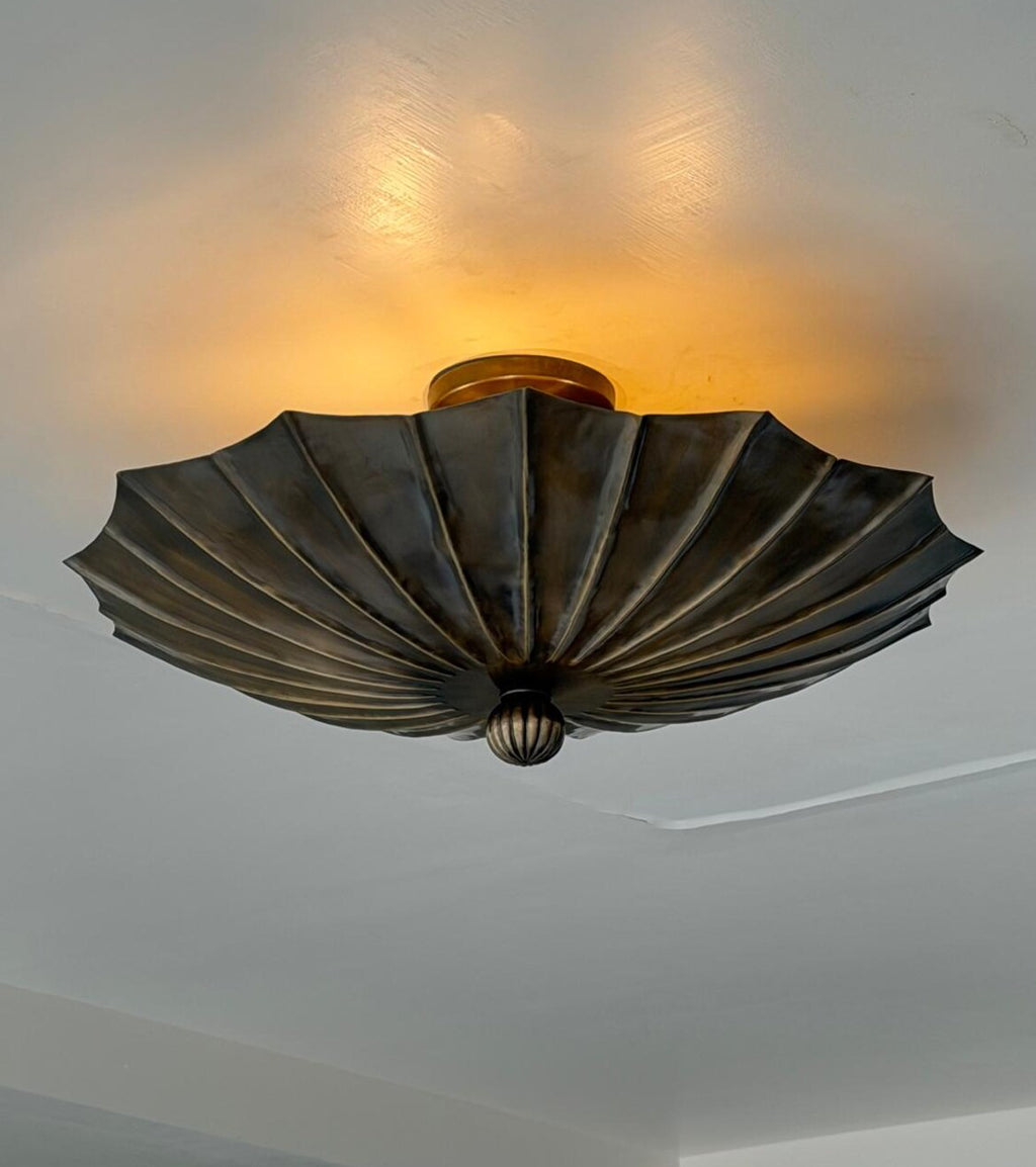 Antique brass sculptural flush mount ceiling light