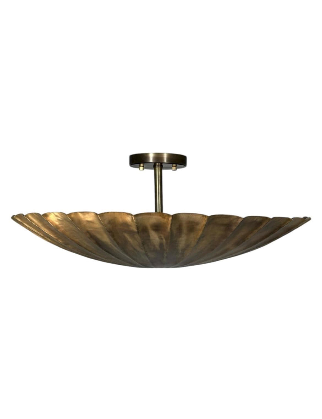 antique brass scallop flush mount ceiling light with shell inspired design.