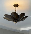 Layered petal brass pendant light in antique finish