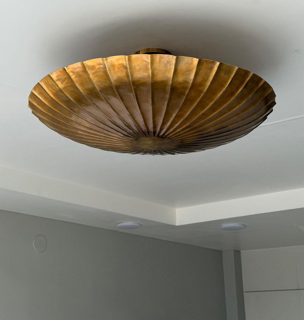 Handmade brass flush mount ceiling light with sculptural design