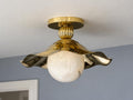 Gold brass ruffled flush mount ceiling light with alabaster globe and wavy flower shade