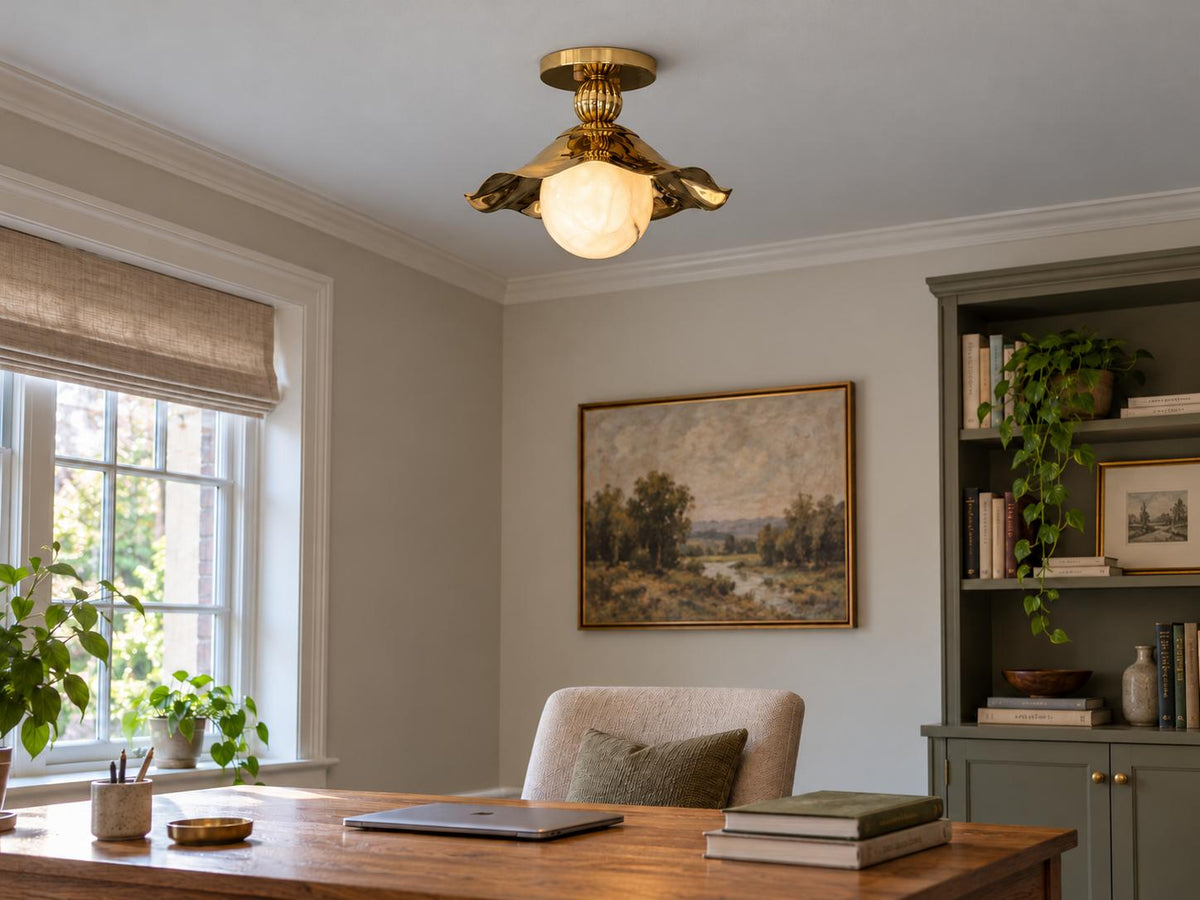 Brass flower flush mount light over dining table with natural light